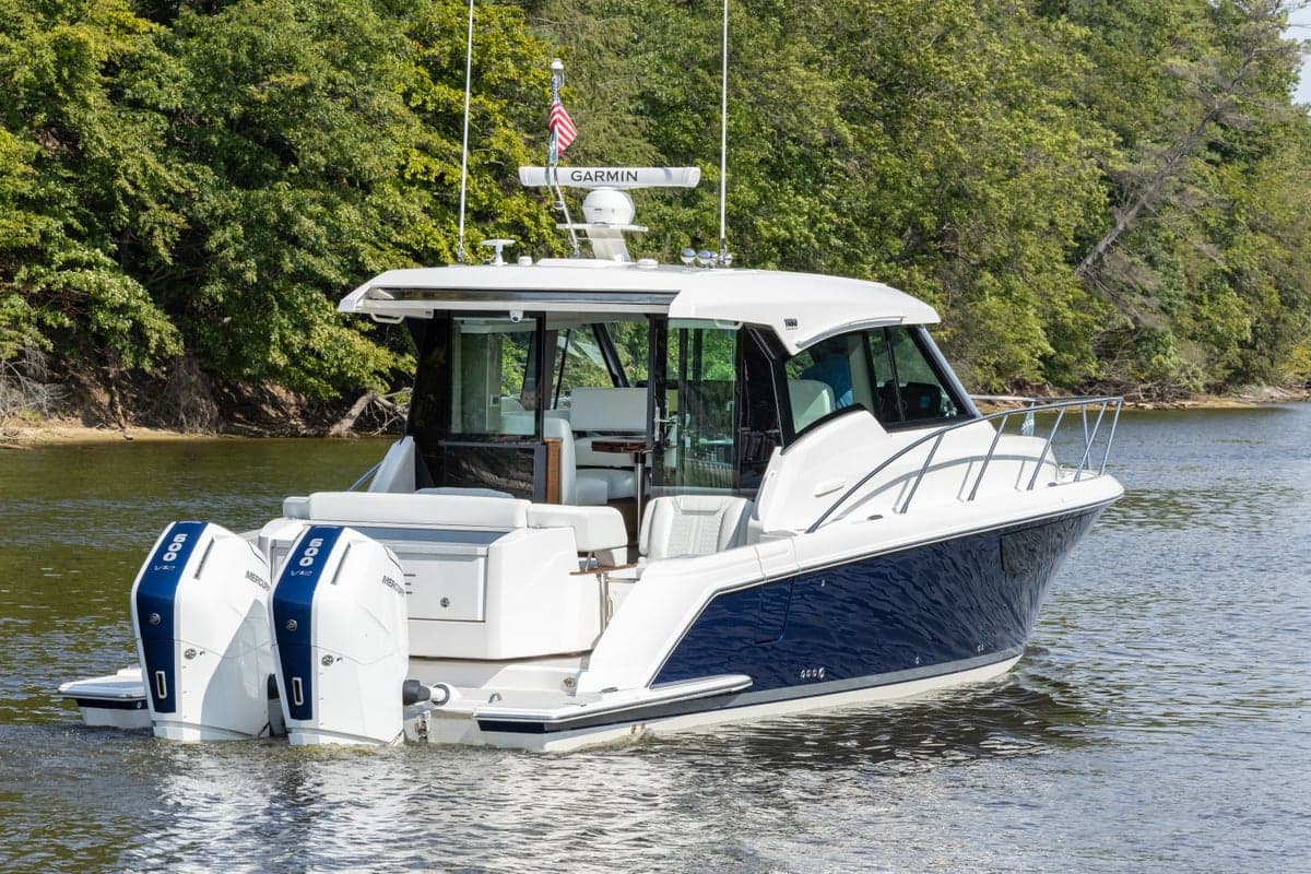 43 LE in the Saugatuck channel, view of cockpit and transom - Hull Color: Viper Blue