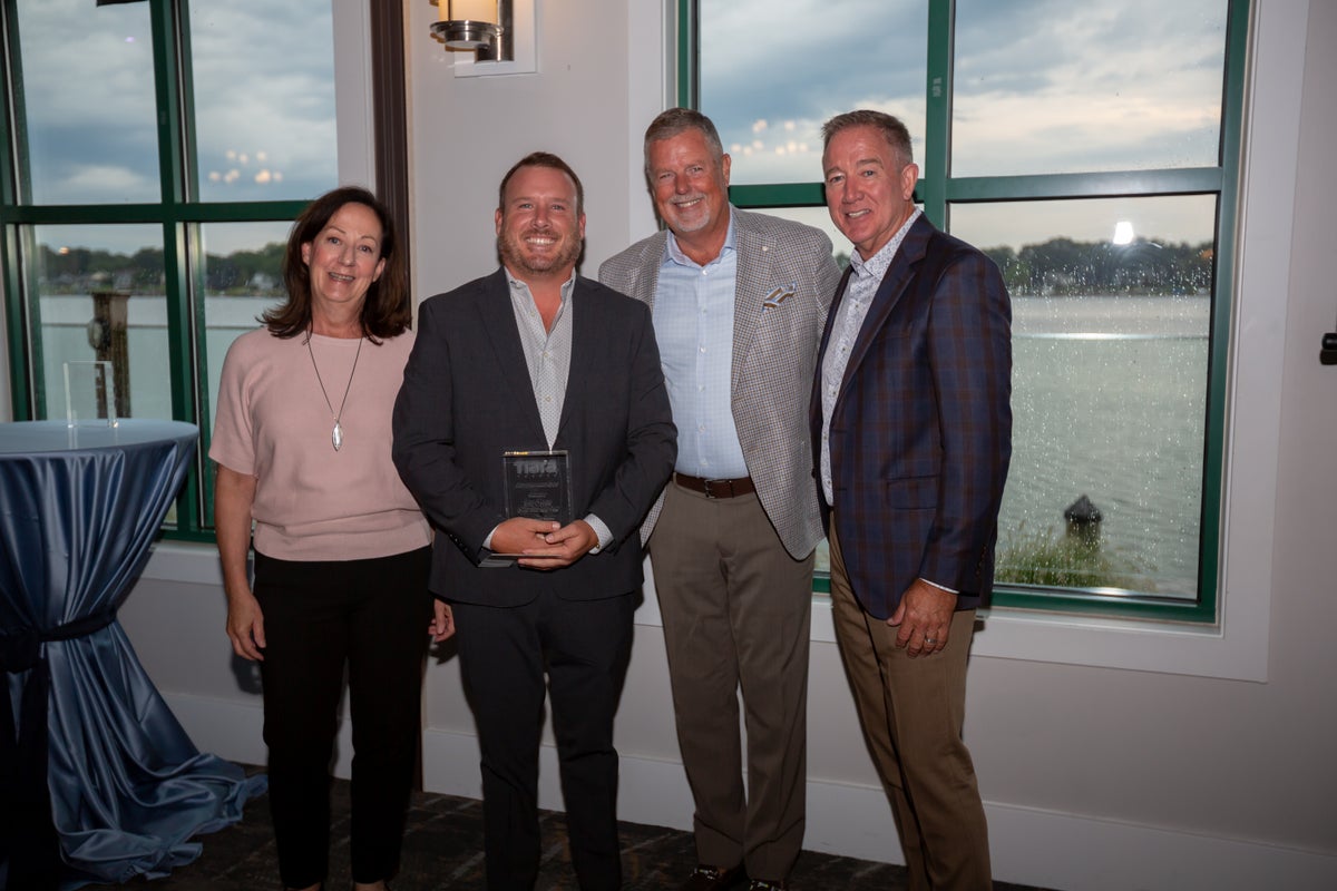 Tiara Dealer Awards with Tiara staff and top salesperson